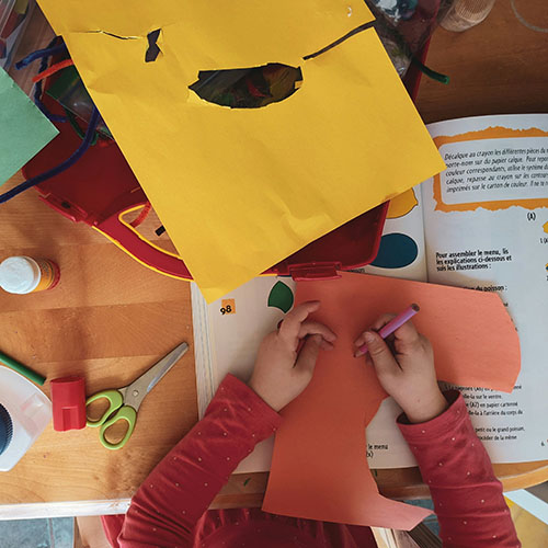 paper on a table with cutouts